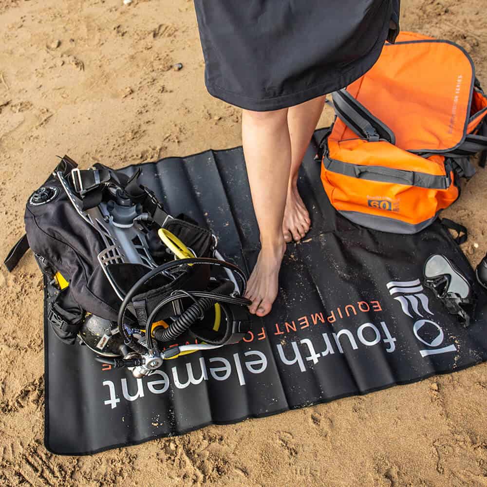 Fourth Element Changing Mat In Use On Beach