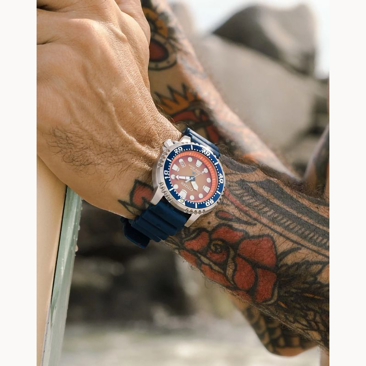 Citizen BN0169-03X Divers Watch, Orange Face + Blue Strap Lifestyle