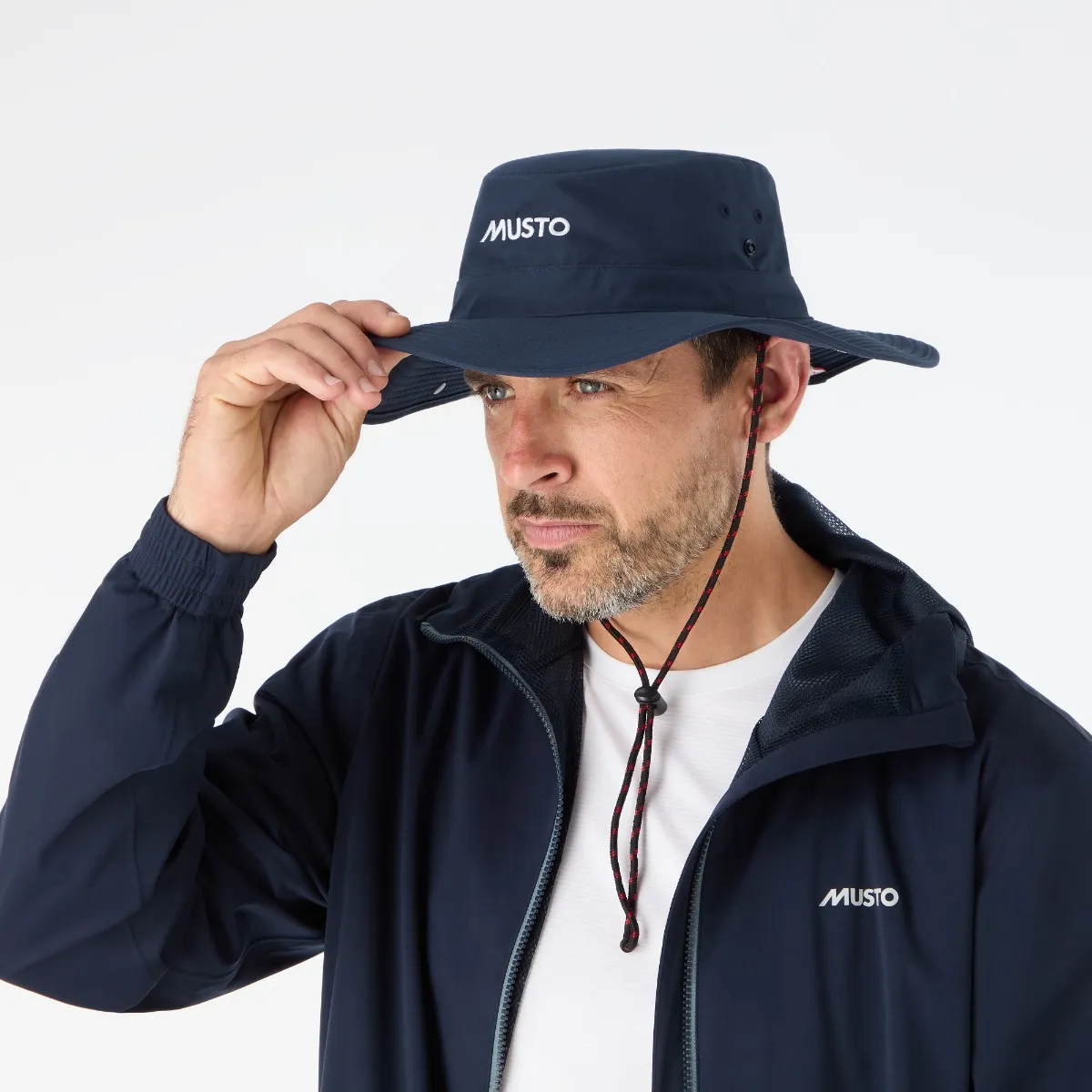 Musto evo fast drying brimmed hat true navy worn