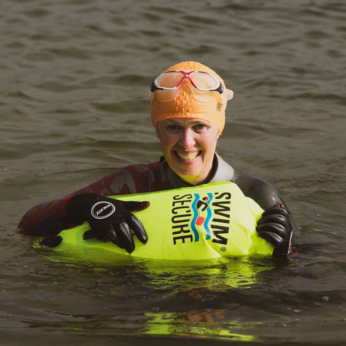 SWIM SECURE CITRUS 28L DRY BAG IN USE